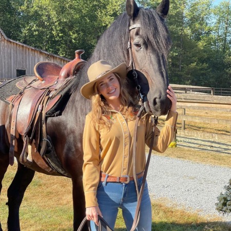 The picture of Kathryn Kohut with a horse.  